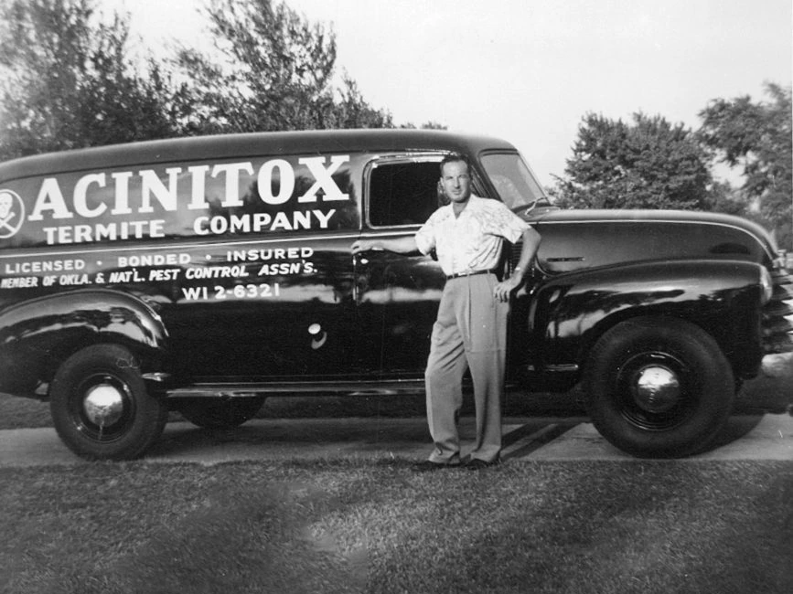 Acenitec founder Ted Roberts beside the original ACINITOX Termite Company truck, 1947